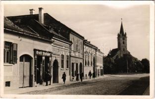 Szászrégen, Reghin; Gróf Csáky utca, német evangélikus templom, Ernst Philippi és Schuster üzlete / street, German Lutheran church, shops (fl)