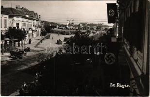 1940 Szászrégen, Reghin; bevonulás, náci horogkeresztes zászlók / entry of the Hungarian troops, Nazi swastika flags. photo + &quot;1940 Szászrégen visszatért&quot; So. Stpl. (ragasztónyom / glue marks)