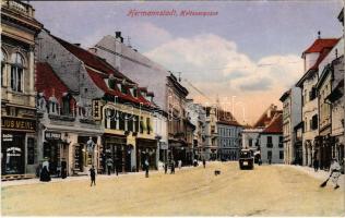 1916 Nagyszeben, Hermannstadt, Sibiu; Heltauergasse / Nagydisznódi utca, Julius Meinl, Max Springer üzlete, villamos. G. A. Seraphin kiadása / street view, shops, tram (EB)