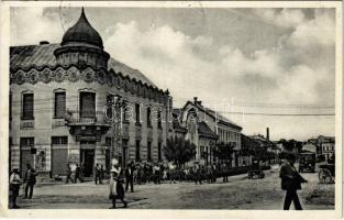 1938 Beregszász, Beregovo, Berehove; Fő utca, Rozenthál üzlete, autó / Hlavní ul. / street + &quot;1938 Beregszász visszatért&quot; So. Stpl (fl)