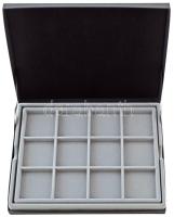 Érmetartó kazetta egy kivehető tálcával, összesen 24db, 50x50mm-es férőhellyel. Használt, de jó álla...