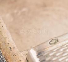 Ezüst (Ag) cigarettatárca, vonalazott mintás díszítéssel, jelzett, bruttó: 158g