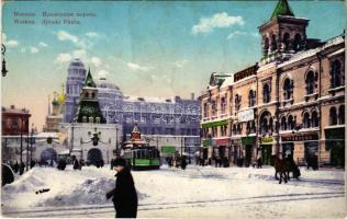 Moscow, Moskau; Iljinski Pforte / Ilyinsky (Ilinka) gate in winter, shops, tram (wet damage)