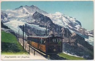 Jungfraubahn mit Jungfrau / mountain rack railway, train (wet damage)