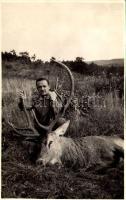Vadász az elejtett szarvassal / Hunter with a dead stag. photo