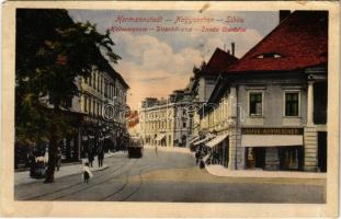 1916 Nagyszeben, Hermannstadt, Sibiu; Disznódi utca, villamos, Julius Wermescher üzlete, Transsylvania szálloda. Kiadja Jos. Drotleff Nr. 502. / Strada Cisnadei / Heltauergasse / street, shops, tram, hotel (EM)