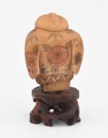 Kínai bölcs. Faragott és festett tagua dió, fa talapzaton, m: 5,5 cm