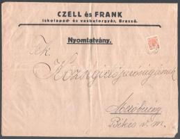 cca 1910 Brassó (Brasov / Kronstadt), Czell és Frank iskolapad- és vasbútorgyár nagyméretű fejléces boríték, hírlapjegy bélyeggel, 31x23,5 cm