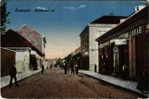 Érsekújvár, Nové Zámky; Komáromi út, Stern Jakab üzlete. Vasúti levelezőlapárusítás 445. / street view, shops (kopott sarkak / worn corners)