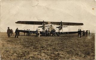 Osztrák-magyar katonai repülőgép (?), pilóta, matrózok / WWI Austro-Hungarian K.u.K. military aircraft (?), pilot, mariners. photo (szakadás / tear)