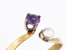14 arany (Au) gyűrű ametiszttel és gyönggyel jelzett m: 55 , br 1,3 g