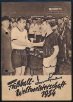 1954 A labdarúgó világbajnokságról a németek által kiadott füzet, a képes füzet a 10 képen nagyrészt a magyar Aranycsapat mérkőzéseivel, majd a végén a német diadallal. Az Aranycsapat két tagjának Buzánszky Jenőnek és Grosics Gyulának autográf aláírásával. Lyukasztással. 1954 The booklet published by the Germans about the soccer world championship, the picture booklet mostly shows the matches of the Hungarian Golden Team in the 10 pictures, and then the German triumph at the end. With the autograph signature of the two members of the Golden Team, Jenő Buzánszky and Gyula Grosics. With punching.