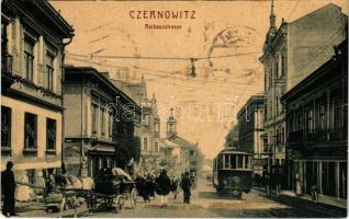 1909 Chernivtsi, Czernowitz, Cernauti, Csernyivci (Bukovina, Bucovina, Bukowina); Rathausstrasse, Apotheke / Town Hall Street, pharmacy, tram, shops. W.L. 2555. (fl)