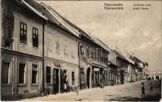 1911 Pétervárad, Peterwardein, Petrovaradin (Újvidék, Novi Sad); Jelaciceva ulica / Jelacic Gasse / Jellasics utca, vendéglő, üzletek / street view, restaurant, shops (fl)