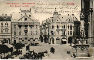 1911 Újvidék, Novi Sad; Ferenc József tér, Szentháromság szobor, Takarékpénztár, Első Magyar Biztosító Társaság, cukrászda, Récsei Gusztáv üzlete. Urbán Ignác kiadása / square, statue, savings bank, insurance company, shops