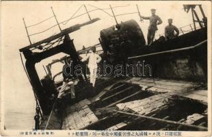 Raising a brocked steamerat. Hokoku Maru, Japanese Navy warship sunken (EK)