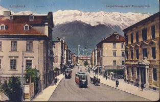 Innsbruck Leopold street with auto garage and trams