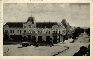 1938 Léva, Levice; Mestsky hotel / Városi szálloda, autóbusz, Kertész üzlete. Feldmann A. kiadása / hotel, autobus, shop + &quot;1938 Léva visszatért&quot; So. Stpl. (vágott / cut)