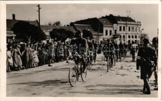 1938 Ipolyság, Sahy; bevonulás, kerékpáros katonák / entry of the Hungarian troops, soldiers on bicycles + &quot;1938 Ipolyság Az Első Visszatért Magyar Város&quot; So. Stpl.