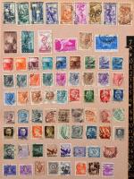 Vegyes külföldi bélyegek a világ minden tájáról egy db régi aláíró könyvben és 1 db berakóban, bennü...