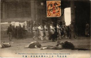 Beijing, Peking; The bodies of executed looters near the Hou men, March 1st 1912. (fl)