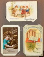 Kb. 200 db RÉGI angol üdvözlő képeslap egy nagy régi szakadt albumban, vegyes minőségben / Cca. 200 pre-1945 English greeting postcards in a big damaged album, mixed quality