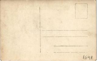 Férfi automobilban fiúval / man with boy in an automobile. photo (EK)