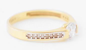 14K arany (Au) gyűrű cirkónnal ékítve, jelzett, méret: 52, br: 1,68 g