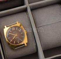 Dekoratív óradoboz benne néhány nagyrészt mechanikus kar- és zsebóra