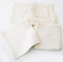 7 darab monogramos nemesi textil szalvéta és terítő, folttal.