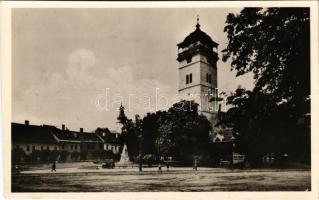1938 Rozsnyó, Roznava; Rákóczy tér, Rákóczi őrtorony, emlékmű, templom, tér, üzlet. Fuchs József kiadása / watchtower, monument, church, square, shop + "1938 Rozsnyó visszatért" So. Stpl. (EK)