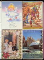 Kb. 380 db MODERN motívum képeslap albumban: karácsonyi és újévi üdvözlőlapok