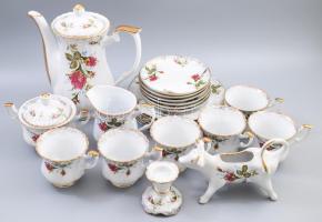 Chodziez 22 részes kávés készlet extra darabokkal, tehén figurális tejszínkiöntővel. Jelzett, jó állapotban, kis kopással. /// Chodzież 22-piece coffee set with extra pieces, featuring a cow-shaped cream jug. Marked, in good condition, with wear.