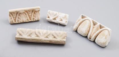 4 darab stukkótöredék és párkánytöredék. Feltehetően 15-17. sz. 3 darab stukkó és egy mészkő, h: 7-15 cm