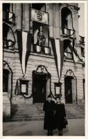 1938 Kassa, Kosice; Bevonulás, Angyalos magyar címer és zászlók Horthy Miklós portréjával a színházon / entry of the Hungarian troops, flag and coat of arms with the portrait of Horthy on theatre. photo