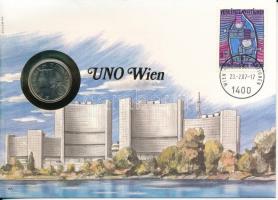 Ausztria / ENSZ Bécs 1987. 10Sch, felbélyegzett borítékban, bélyegzéssel, német nyelvű leírással T:UNC Austria / UNO Vienna 1987. 10 Schilling in envelope with stamp and cancellation, with German description C:UNC