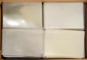 Egy doboznyi (kb. 1400 db) műanyag képeslaptartó tok / A box of plastic postcard holder cases, Cca. 1400 pieces (14,5 x 9,5 cm)