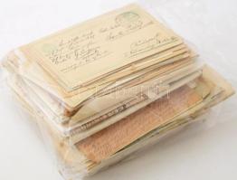 cca 1900-1950 vegyes papírrégiség tétel, össz. kb. 160 db: számlák (1910-es évek), tábori posta, bizonyítványok, ideiglenes munkavállalási engedély, fotók, levelekel, képeslapok, zárt levelező lapok stb., részben Szente József építésznek küldve