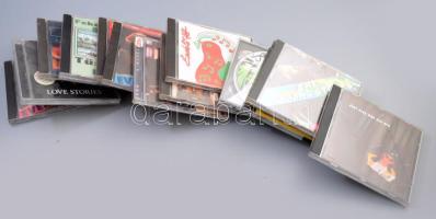 15 darab zömmel zenei CD, közte Charlie, The Rolling Stones, Hobo, Evergreens, ABBA, stb.
