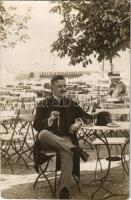 1910 Majori, Majorenhof bei Riga; Seebad / a man sitting in a beach bar. photo (EB)