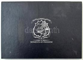 1db éremtartó tálca "Republic of Liberia - Moments of Freedom" felirattal, 24db 44mm-es férőhellyel. Használt, jó állapotban.