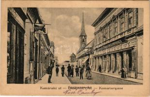 Érsekújvár, Nové Zámky; Komáromi út, templom, Ruhig Sándor, Komáromi Ede üzlete. Pollák V. kiadása / street, church, shops (EK)