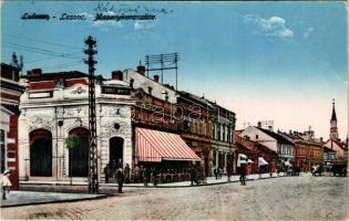 Losonc, Lucenec; Masarykova ulica / Masaryk utca, Szüsz Miksa kávéháza, üzletek. Greiner kiadása / street view, café, shops + "1938 Losonc visszatért" So. Stpl. (gyűrődés / crease)
