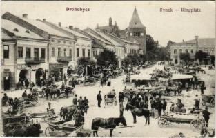 Drohobych, Drohobycz, Drohobics; Rynek / Ringplatz / market square, shop of Berger. Verlag Leon Rosenschein (fl)