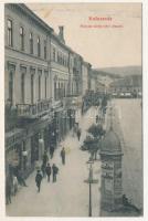 1910 Kolozsvár, Cluj; Mátyás király téri részlet, hirdetőoszlop Turul cipő, Brázay reklámmal, takarékpénztár, üzletek, háttérben Mátyás király szülőháza / square, advertising column with advertisements, savings bank, shops, birthplace of Matthias Corvinus in the background (ragasztónyom / glue marks)