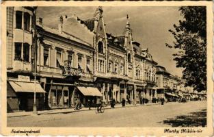 1941 Szatmárnémeti, Szatmár, Satu Mare; Horthy Miklós tér, Freund, Fischer üzlete, bicikli / square, shops, bicycle (kopott sarkak / worn corners)