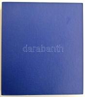 Négygyűrűs berakóalbum összesen 35db műanyag berakólappal, használt állapotban