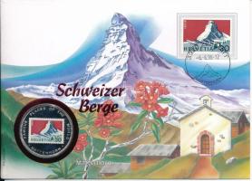 Uganda 1996. 1000Sh Cu-Ni felbélyegzett "Svájci hegyek - Matterhorn" borítékban, bélyegzéssel T:UNC Uganda 1996. 1000 Shillings Cu-Ni in "Swiss mountains - Matterhorn" envelope with stamp and cancellation C:UNC
