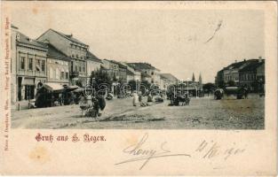1901 Szászrégen, Sächsisch-Regen, Reghin; Piactér, üzletek. Rudolf Burghardt kiadása / market square, shops + "SZÁSZ-RÉGEN - KOCSÁRD 130. SZ." vasúti mozgóposta bélyegző (fl)