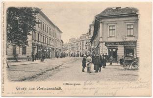 1901 Nagyszeben, Hermannstadt, Sibiu; Heltauergasse / Disznódi utca, Julius Wermescher, Carl Landmann üzlete, Transsylvania szálloda. Verlag d. Buchh. G. A. Seraphin. Lichdtruck v. Jos. Drotleff / street view, shops, hotel (gyűrődés / crease)